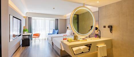 Quarto luxo, 2 camas de solteiro | Frigobar, cofres nos quartos, escrivaninha, Wi-Fi de cortesia