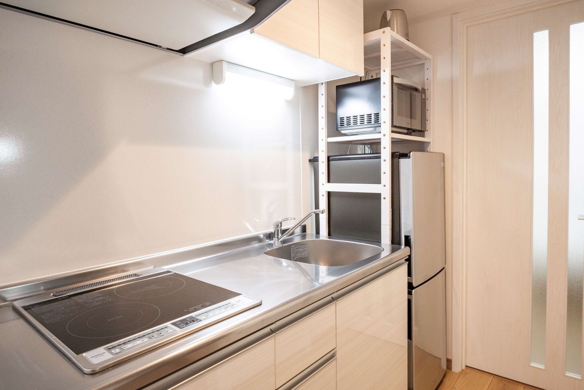 Fridge, microwave, stovetop, cookware/dishes/utensils