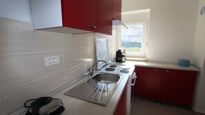 Refrigerador, horno, parrilla de estufa y tostadora