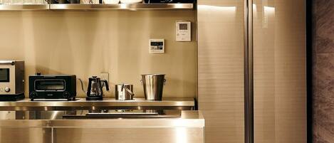 Fridge, microwave, stovetop, cookware/dishes/utensils