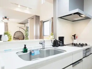 Fridge, microwave, stovetop, cookware/dishes/utensils
