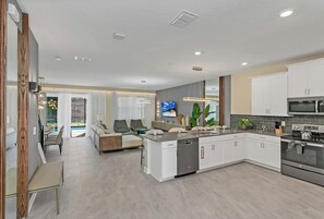State-of-the-art appliances, ample counter space, and a stylish design create the perfect setting for your culinary adventures. - Incredible 9BR! Private Pool+Theme Rooms+Game Room (Kissimmee)