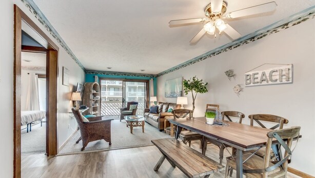 Condo, 2 Bedrooms (M-103) | Living room | TV, DVD player - Shipwatch Pointe by Escape (Myrtle Beach)