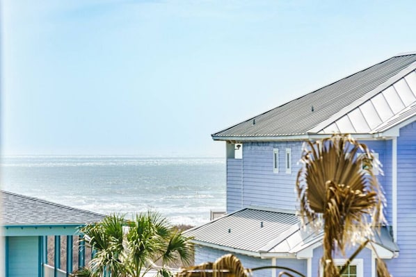 A coastal building with a view of the ocean.