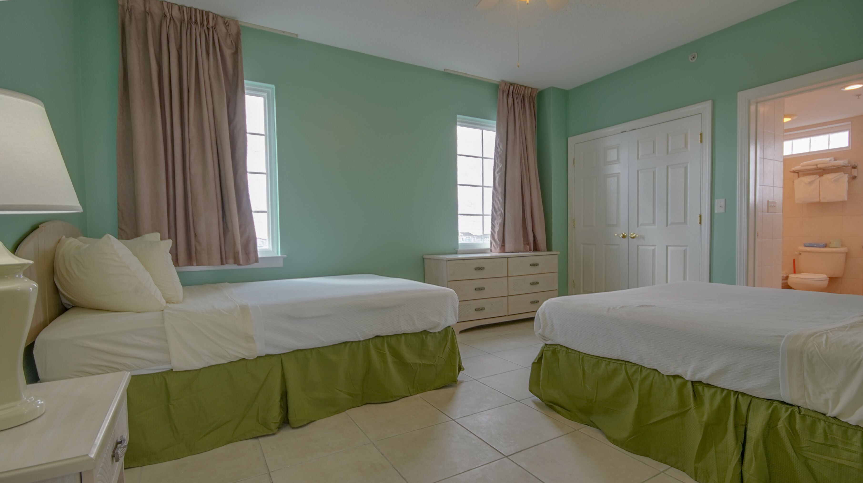 Deluxe Condo | Desk, laptop workspace, blackout drapes, iron/ironing board