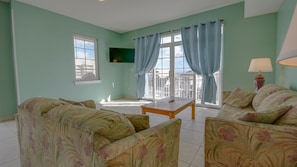 Traditional Condo | Living area | 42-inch Smart TV with satellite channels, TV - Americana Princess Suites and Condos (Ocean City)