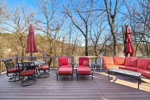 Relax and socialize on the spacious deck with a variety of seating options.