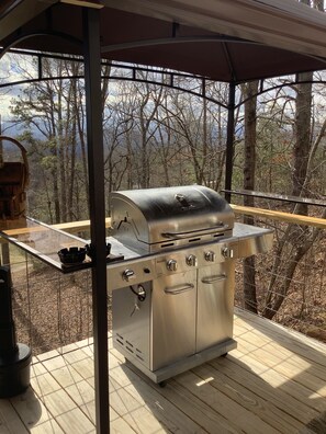 Gas grill on porch 