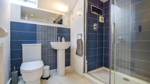 Shower, free toiletries, hair dryer, towels