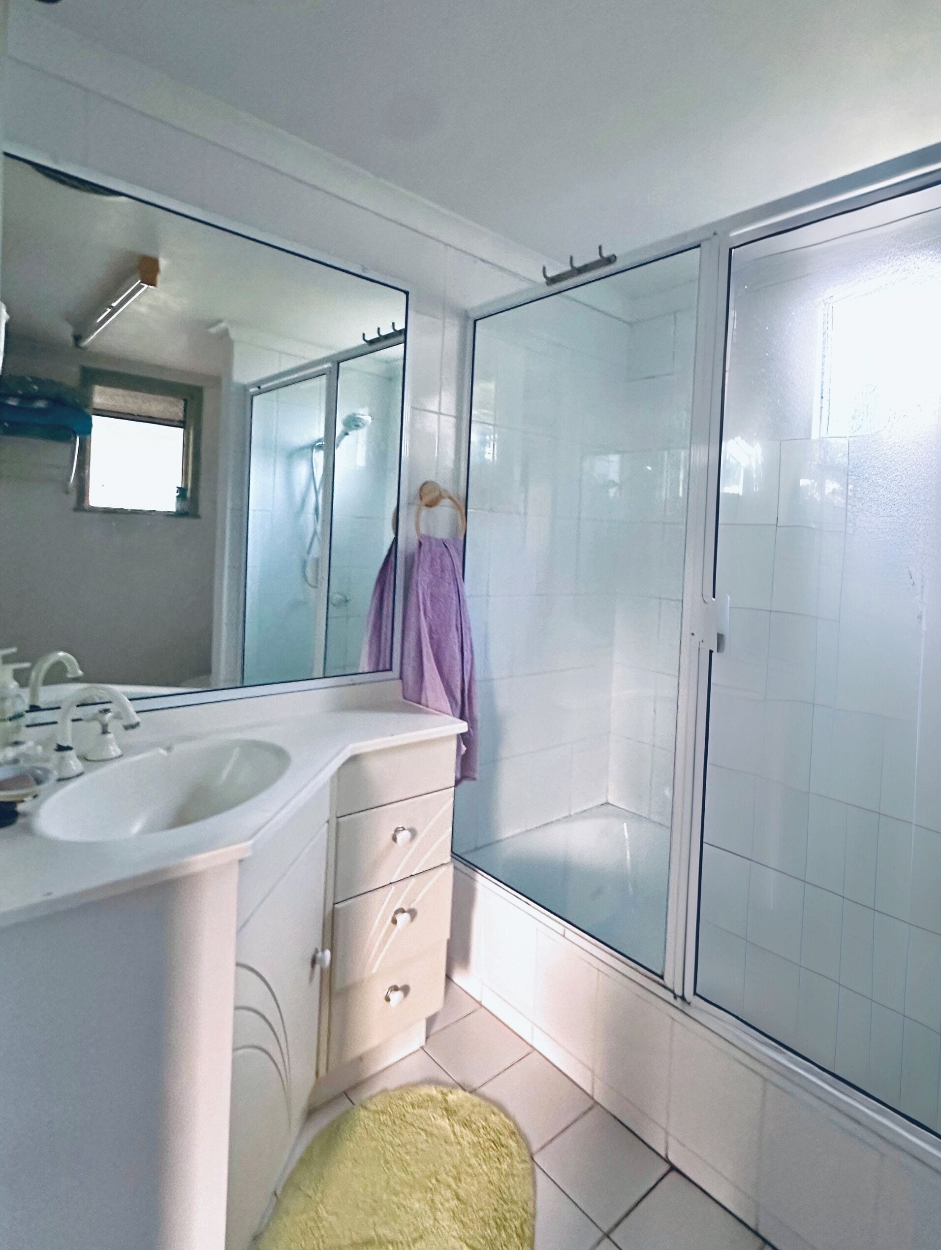 Combined shower/bathtub, hair dryer, towels, soap