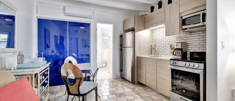 Fridge, microwave, stovetop, coffee/tea maker