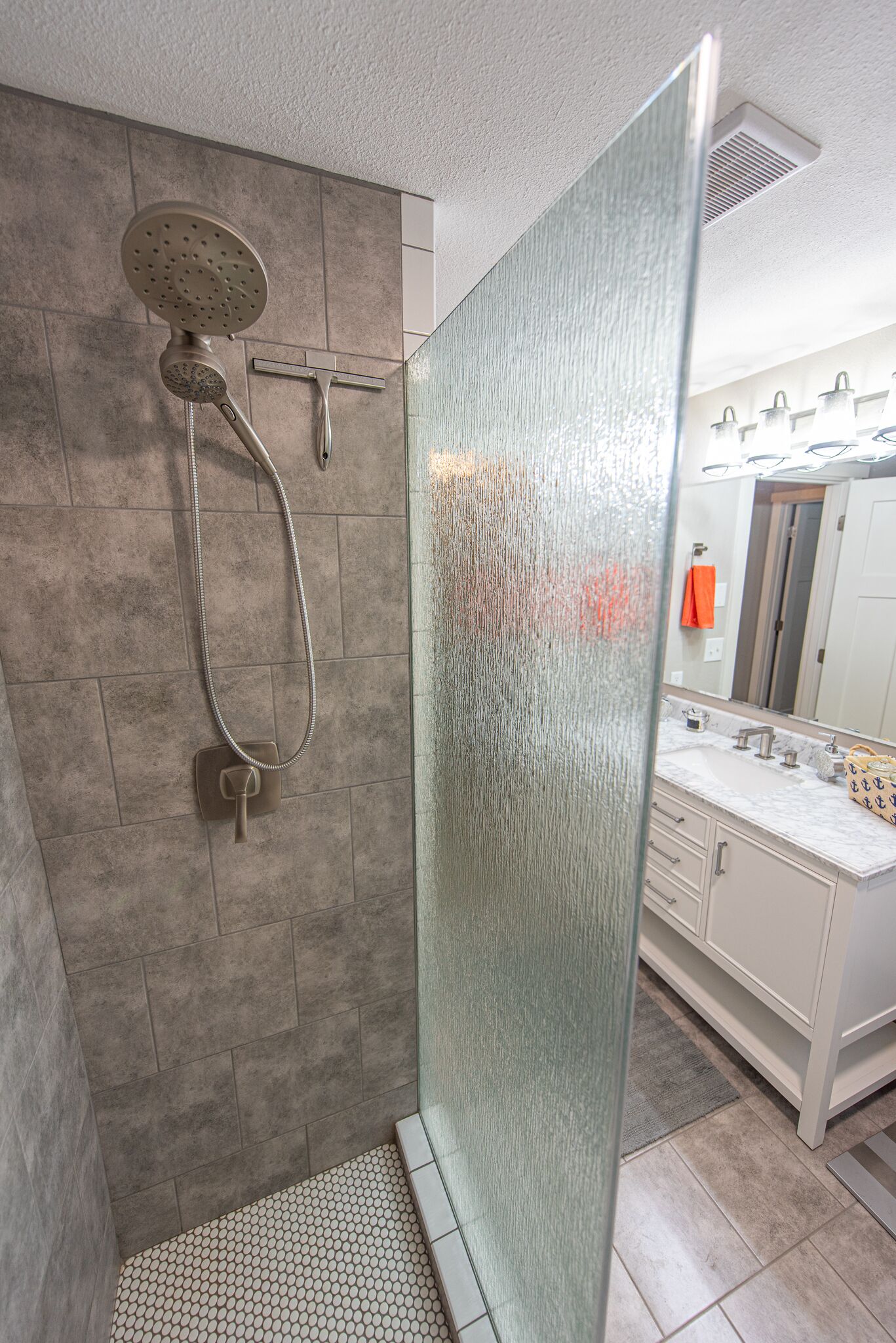 Shower, hair dryer, towels, toilet paper