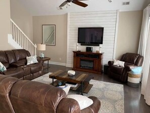 Smart TV, fireplace, DVD player, books