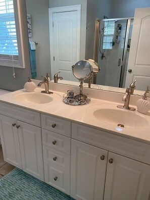 Combined shower/tub, hair dryer, towels, soap