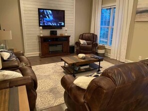 Smart TV, fireplace, DVD player, books