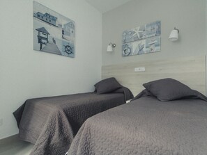 1 slaapkamer, een strijkplank/strijkijzer, wifi, beddengoed