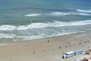 On the beach, sun loungers, beach towels