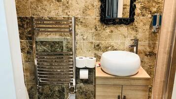 Shower, bidet, towels, soap