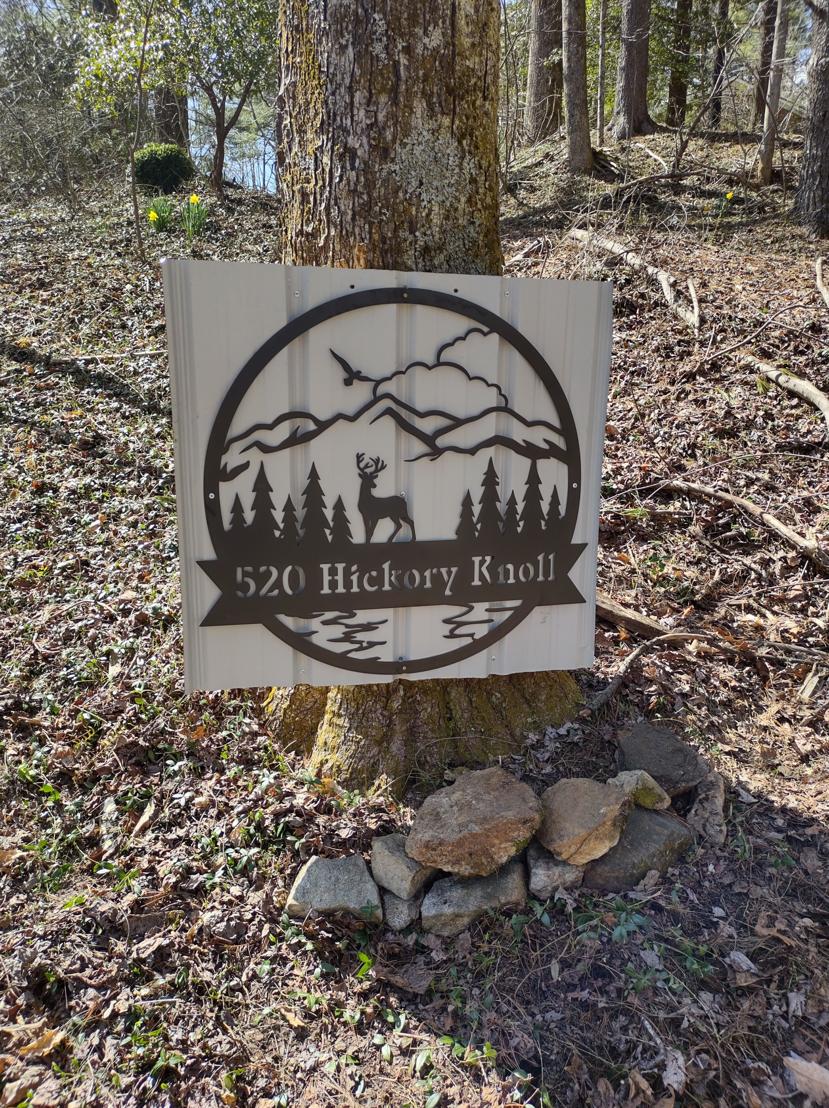 Sign at approach to the cabin.