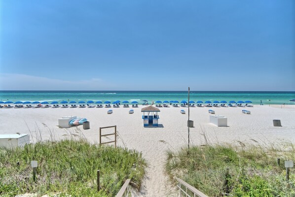 On the beach, sun-loungers