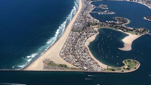 An aerial view of a coastal city with a long beach, marina, and densely packed urban area. - Luxury, Ground Floor Studio #4 just 167 steps to the Best Beach in San Diego! (San Diego)