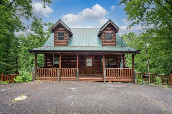 Front of cabin and 2 parking spots.