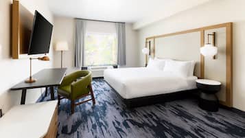 Down duvets, desk, laptop workspace, blackout curtains