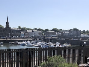 Stunning harbor views with historic church and charming townhouses.