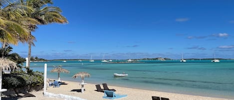 On the beach, sun-loungers, beach towels