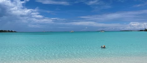 On the beach, sun loungers, beach towels
