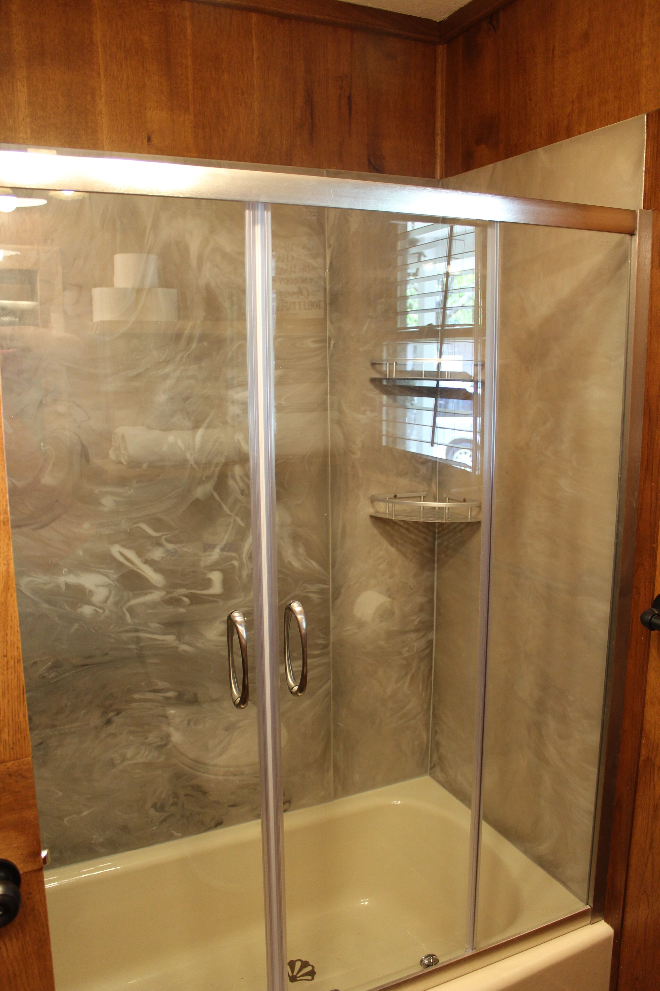 Combined shower/bathtub, hair dryer, towels, soap