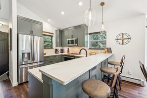 Fridge, microwave, oven, stovetop - Experience mountain living at 'Above it All' in Breckenridge, a cozy 3-bedroom retreat! (Breckenridge)