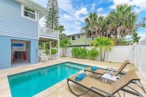 A heated pool - AMI Sand Dollar: Dog Friendly, Private Pool, 2 Blocks to Beach by Anna Maria Life Vacation Rentals (Holmes Beach)