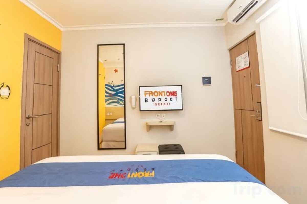 Premium bedding, desk, laptop workspace, soundproofing