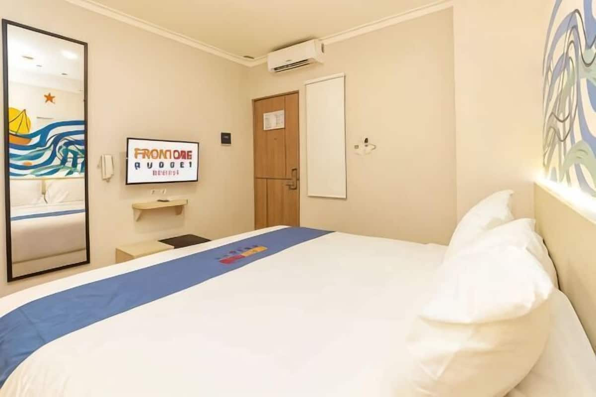 Premium bedding, desk, laptop workspace, soundproofing