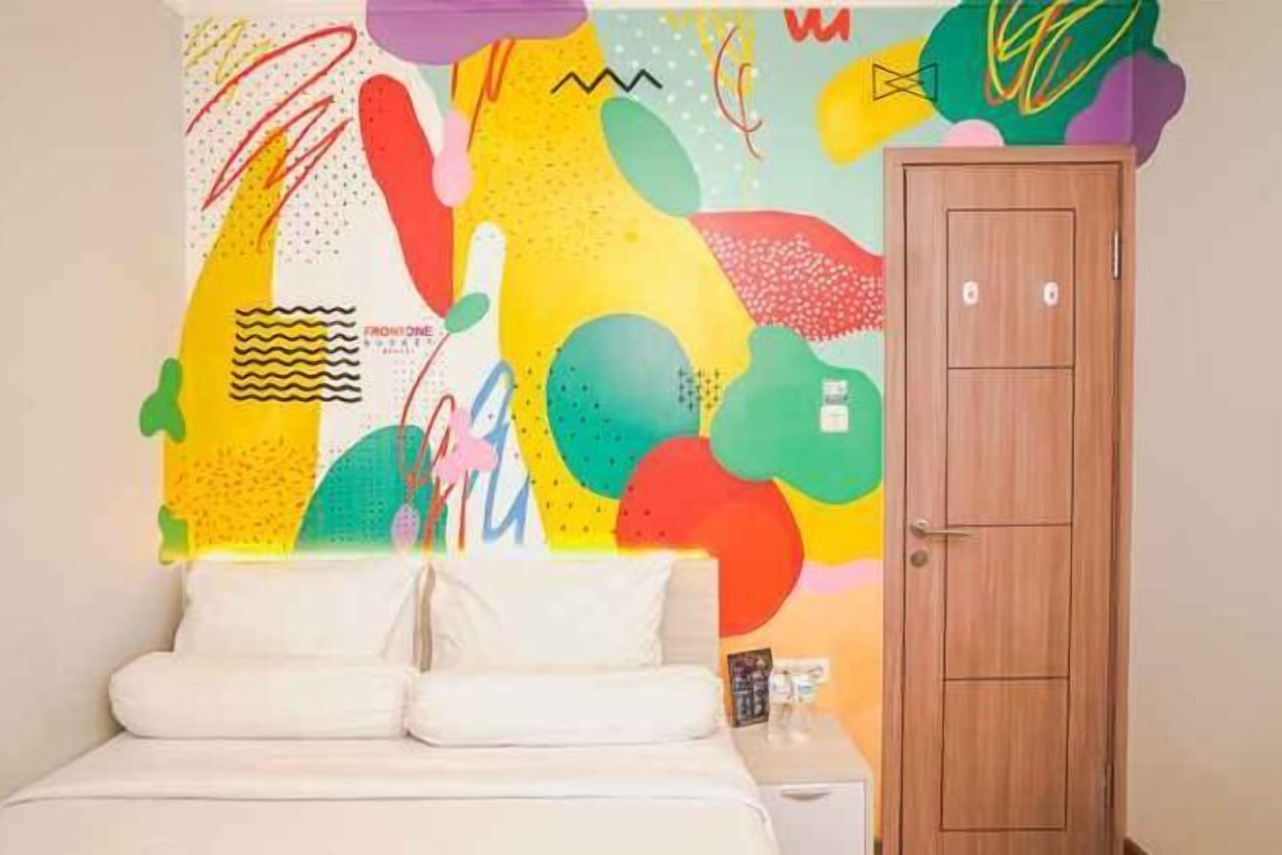 Premium bedding, desk, laptop workspace, soundproofing