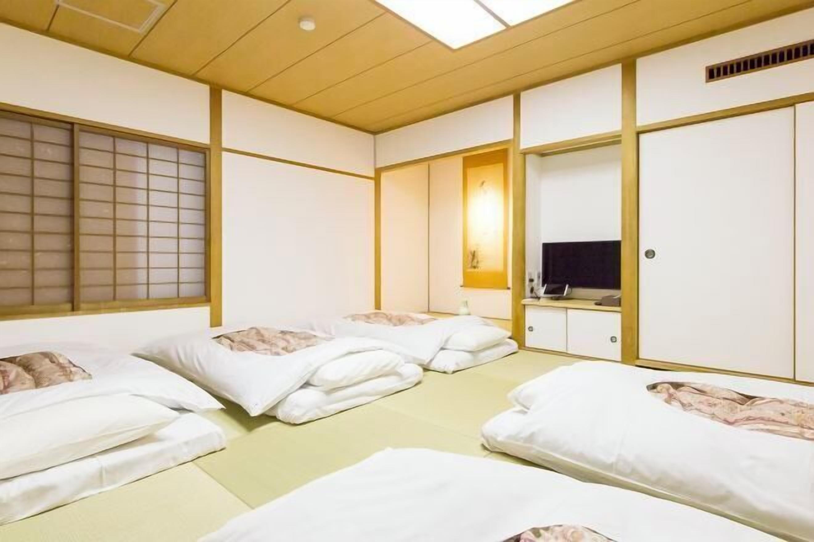 Down comforters, desk, laptop workspace, blackout drapes