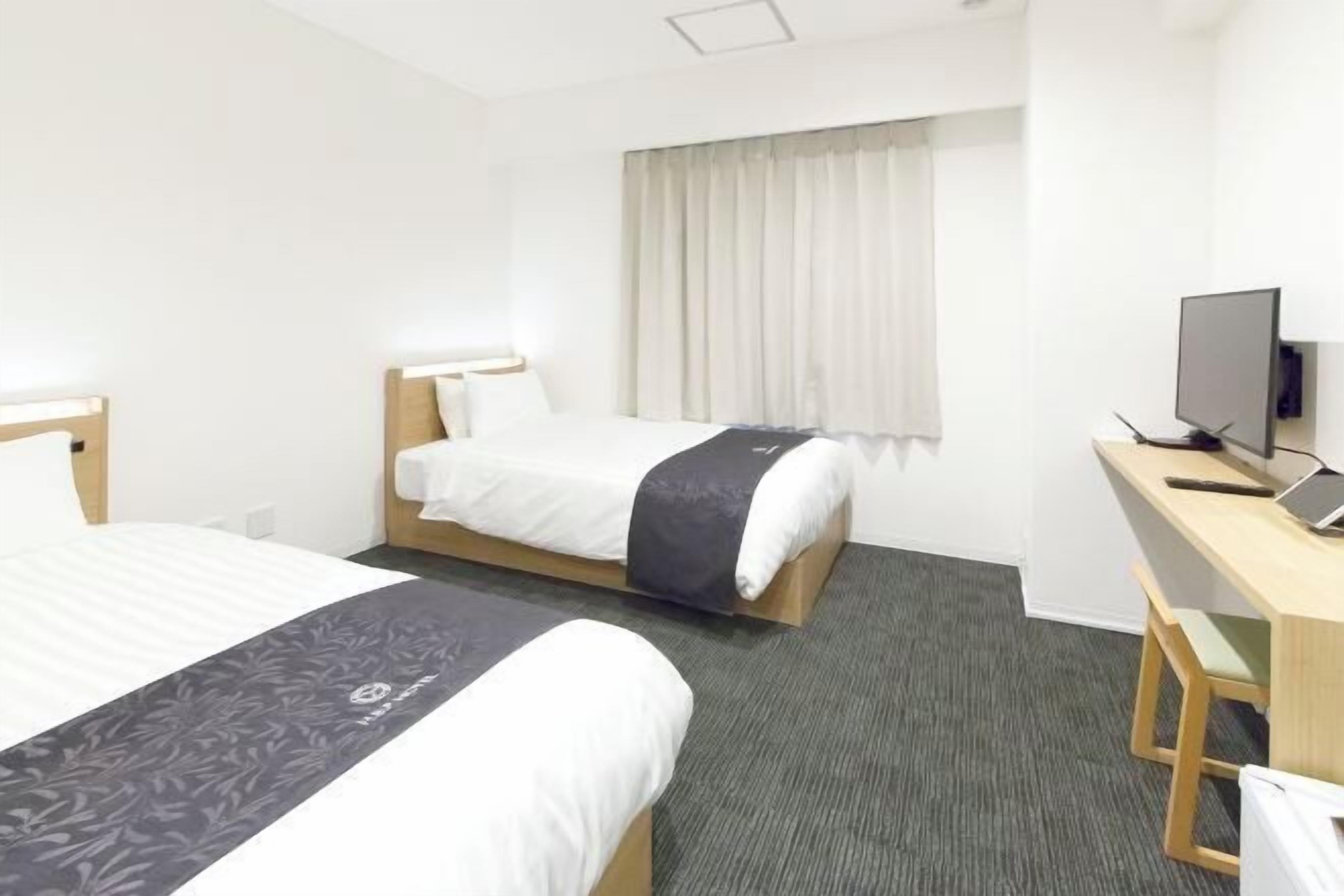 Down comforters, desk, laptop workspace, blackout drapes