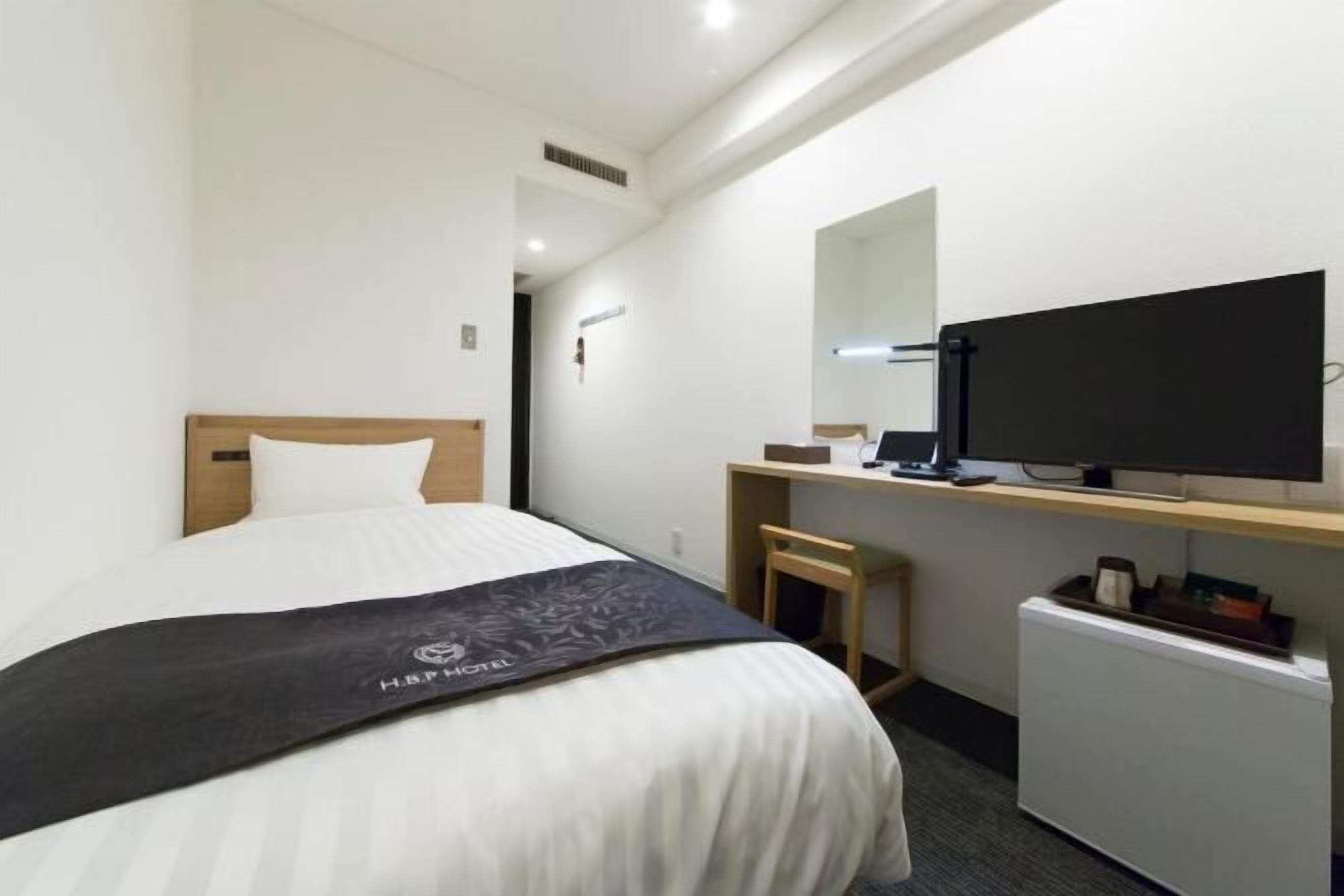 Down comforters, desk, laptop workspace, blackout drapes