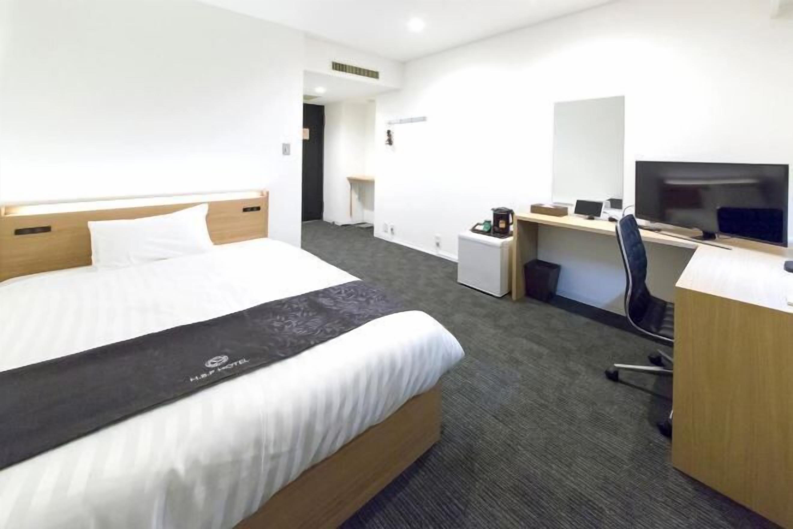 Down comforters, desk, laptop workspace, blackout drapes