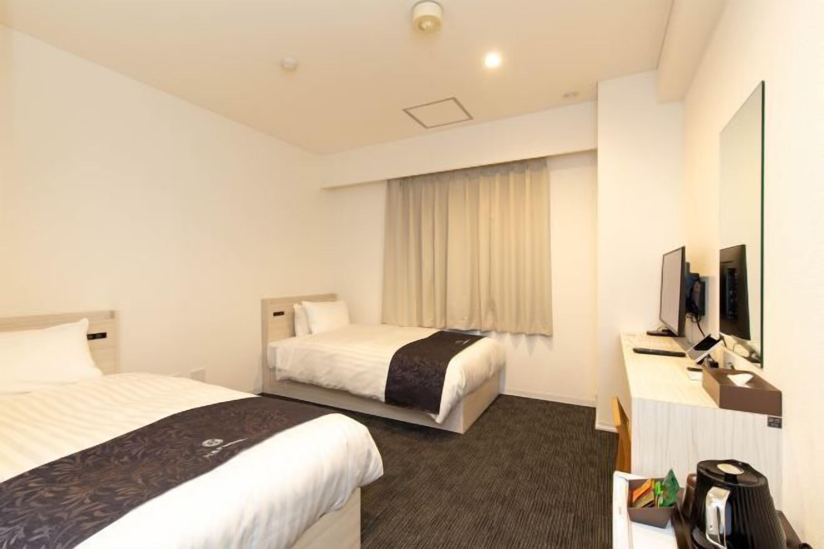 Down comforters, desk, laptop workspace, blackout drapes