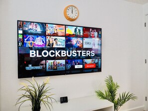 32-inch flat-screen TV with digital channels, TV, Netflix