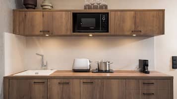 Apartment, 1 Bedroom | Private kitchen | Fridge, microwave, stovetop, dishwasher