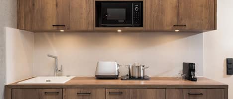 Apartment, 1 Bedroom | Private kitchen | Fridge, microwave, stovetop, dishwasher