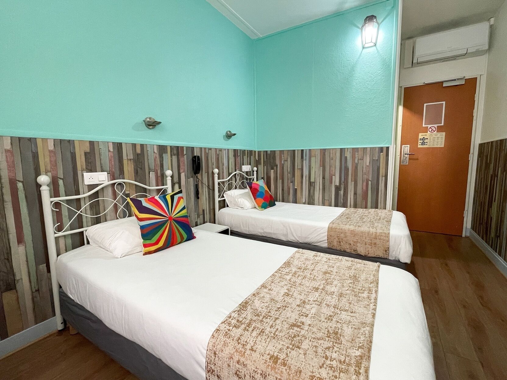 Premium bedding, desk, laptop workspace, blackout drapes