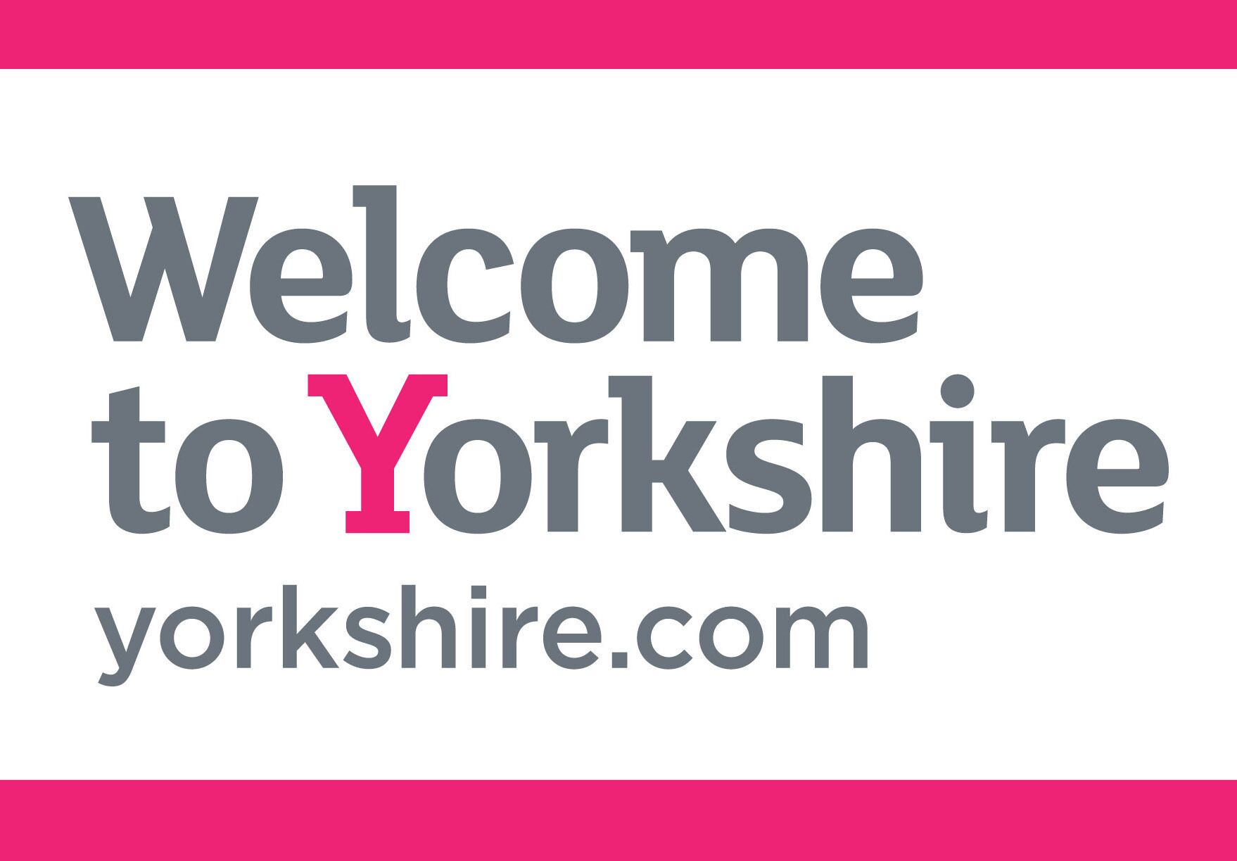 A welcome sign for Yorkshire with the text "Welcome to Yorkshire" and the website "yorkshire.com".