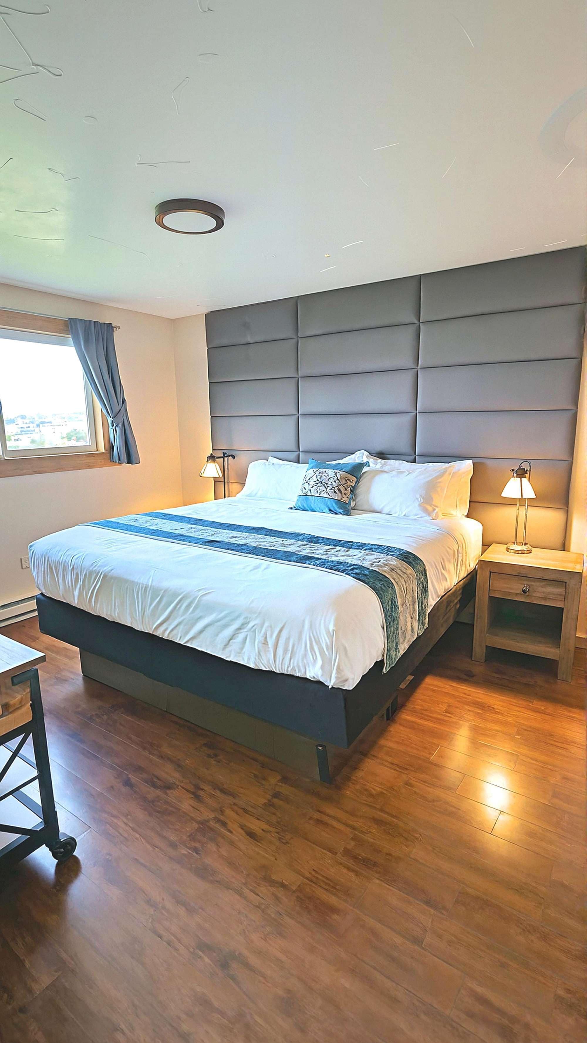 2 bedrooms, desk, blackout drapes, iron/ironing board