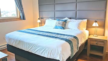 2 bedrooms, desk, blackout curtains, iron/ironing board