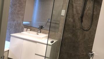 Shower, towels, soap, shampoo