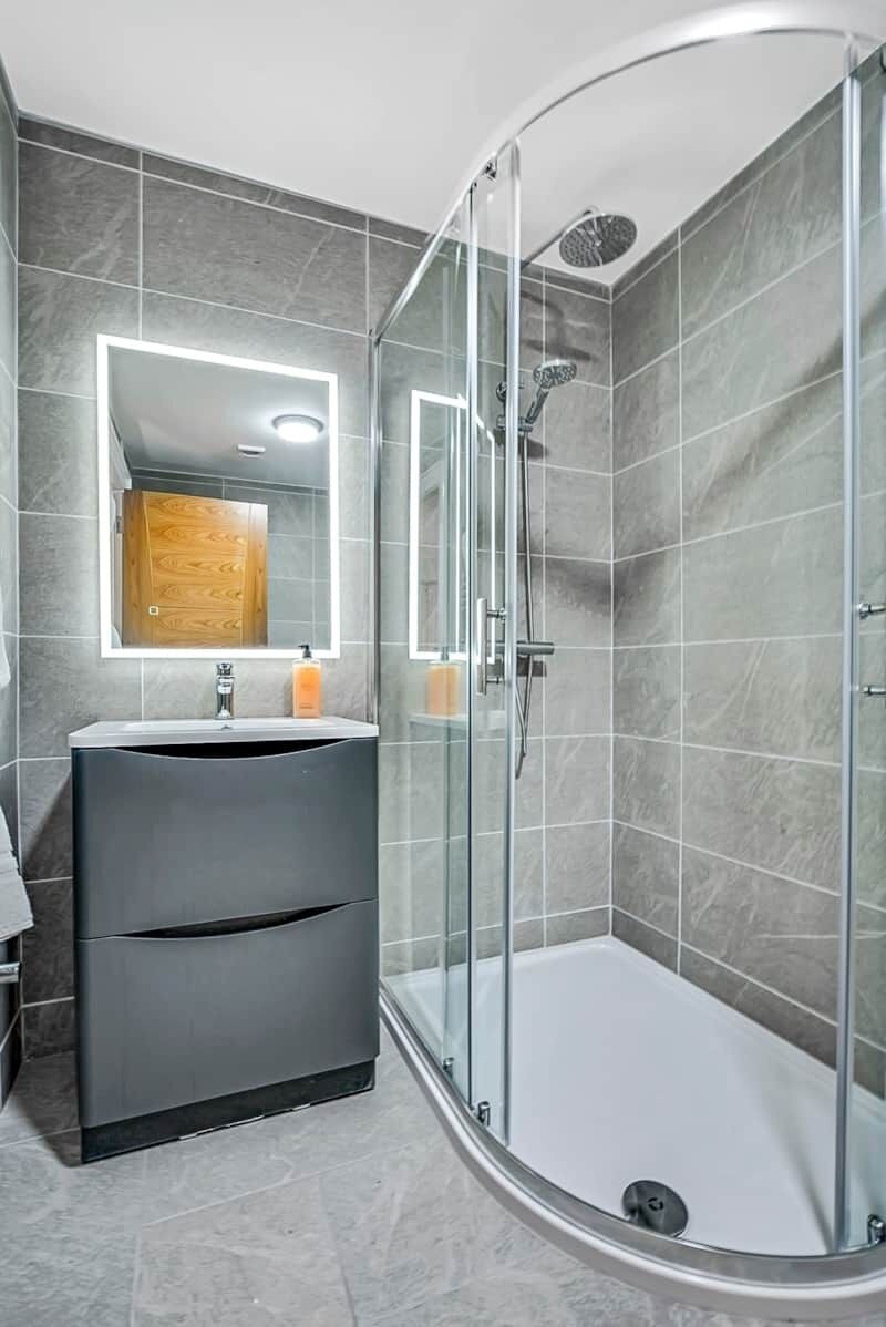 Shower, towels, soap, toilet paper